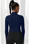 Kadın Lacivert Uzun Kol Fermuarlı Parmak Geçme Detaylı Dik Yaka Crop Top Bluz – Şık, Rahat Ve Kolay Kombinlenebilir