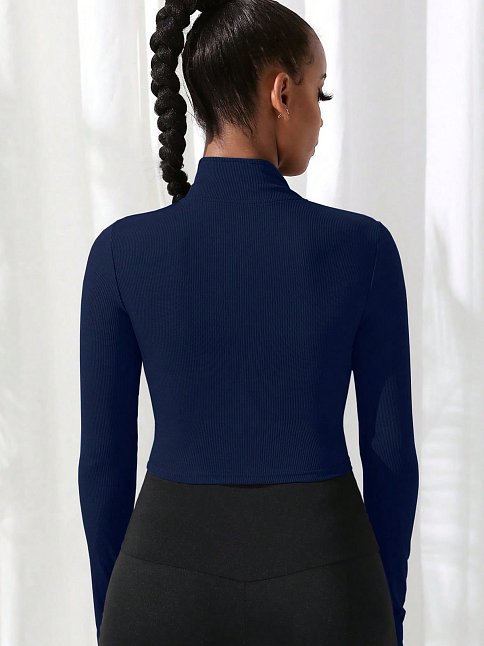 Kadın Lacivert Uzun Kol Fermuarlı Parmak Geçme Detaylı Dik Yaka Crop Top Bluz – Şık, Rahat Ve Kolay Kombinlenebilir