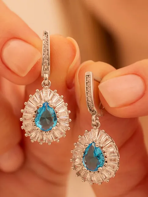 Kadın Gümüş Küpe - Damla Model Mavi Topaz Taşlı Baget Süslemeli Rodyumlu Kadın Küpe