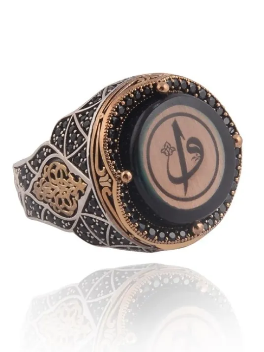 İslam Usta Elif Vav Yazılı Mavi Kehribar Taşlı Yanı İşlemeli Erkek Gümüş Yüzük İslam Usta Elif Vav Yazılı Mavi Kehribar Taşlı Yanı İşlemeli Erkek Gümüş Yüzük