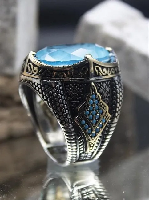 Mavi Paraiba Taşlı ve Firuze Süslemeli Yanları İşlemeli Oval 925 Ayar Gümüş Erkek Yüzük