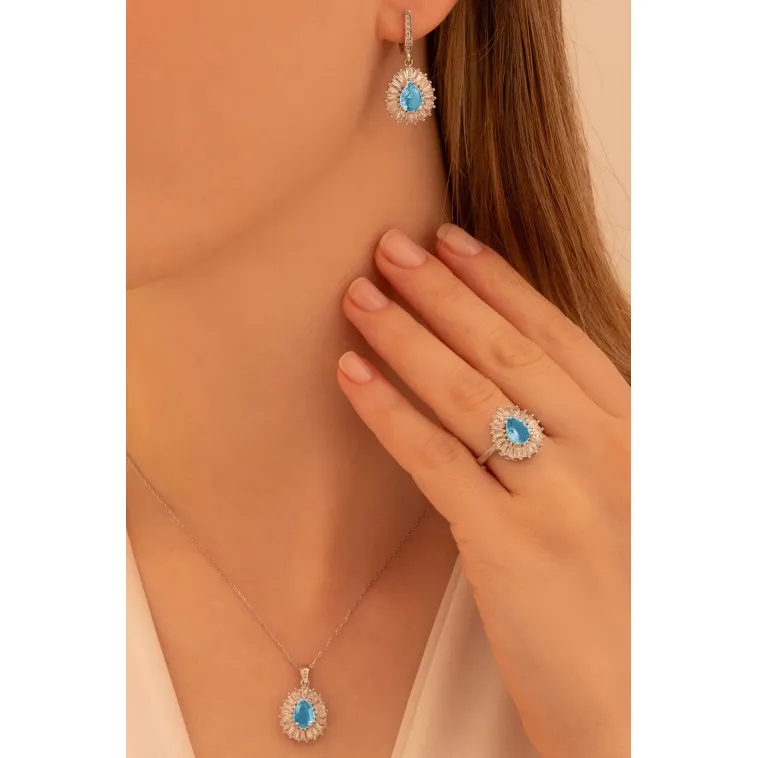 Kadın Gümüş Set - Damla Model Mavi Topaz Taşlı Baget Süslemeli Rodyumlu Kadın Set Kadın Gümüş Set - Damla Model Mavi Topaz Taşlı Baget Süslemeli Rodyumlu Kadın Set