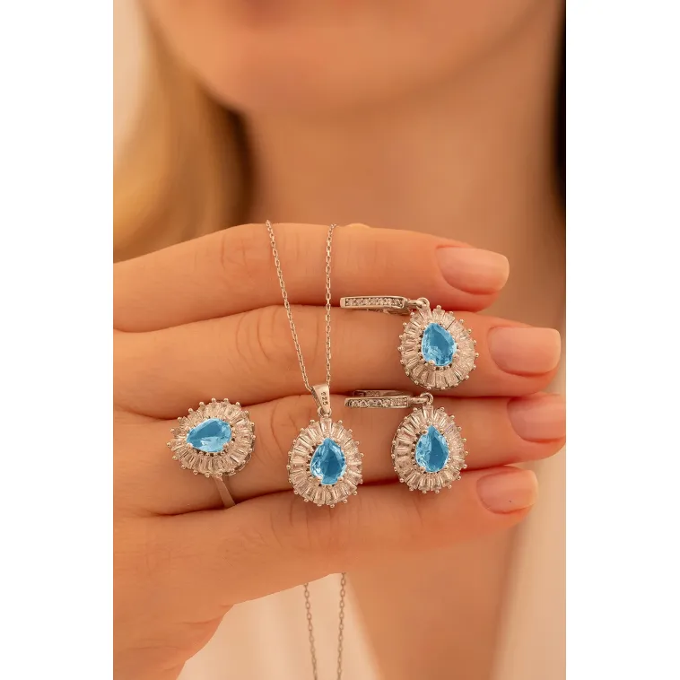 Kadın Gümüş Set - Damla Model Mavi Topaz Taşlı Baget Süslemeli Rodyumlu Kadın Set Kadın Gümüş Set - Damla Model Mavi Topaz Taşlı Baget Süslemeli Rodyumlu Kadın Set