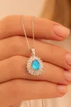 Kadın Gümüş Kolye - Damla Model Mavi Topaz Taşlı Baget Süslemeli Rodyumlu Kadın Kolye Kadın Gümüş Kolye - Damla Model Mavi Topaz Taşlı Baget Süslemeli Rodyumlu Kadın Kolye