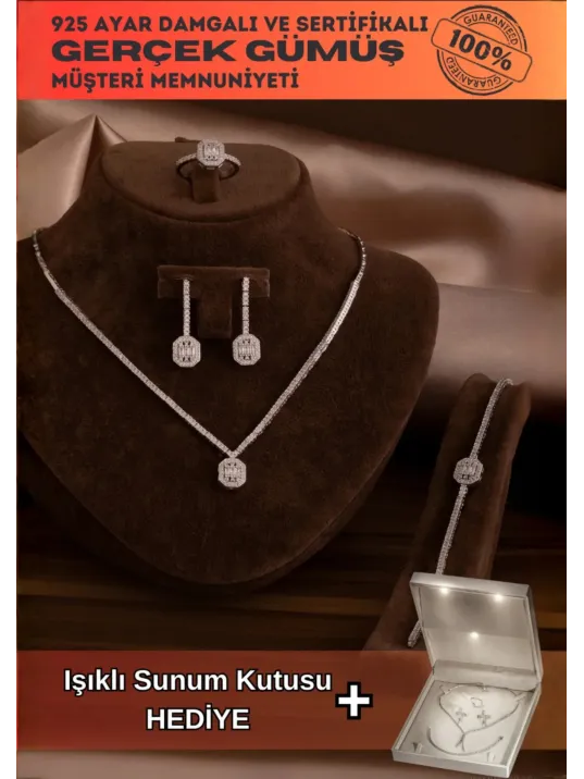 Kadın Gümüş Takı Seti - Ferahnaz Baget Taşlı Zirkon Süslemeli 925 Ayar Kolye, Bileklik, Yüzük, Küpe Tam Set Kadın Gümüş Takı Seti - Ferahnaz Baget Taşlı Zirkon Süslemeli 925 Ayar Kolye, Bileklik, Yüzük, Küpe Tam Set