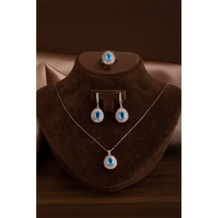 Kadın Gümüş Set - Damla Model Mavi Topaz Taşlı Baget Süslemeli Rodyumlu Kadın Set Kadın Gümüş Set - Damla Model Mavi Topaz Taşlı Baget Süslemeli Rodyumlu Kadın Set