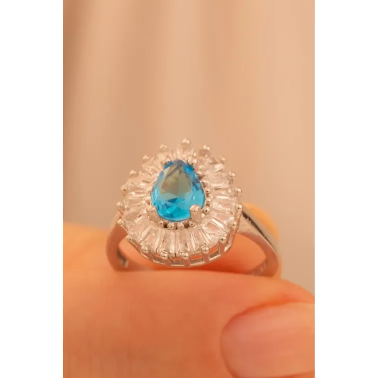 Kadın Gümüş Yüzük - Damla Model Mavi Topaz Taşlı Baget Süslemeli Rodyumlu Kadın Yüzük Kadın Gümüş Yüzük - Damla Model Mavi Topaz Taşlı Baget Süslemeli Rodyumlu Kadın Yüzük