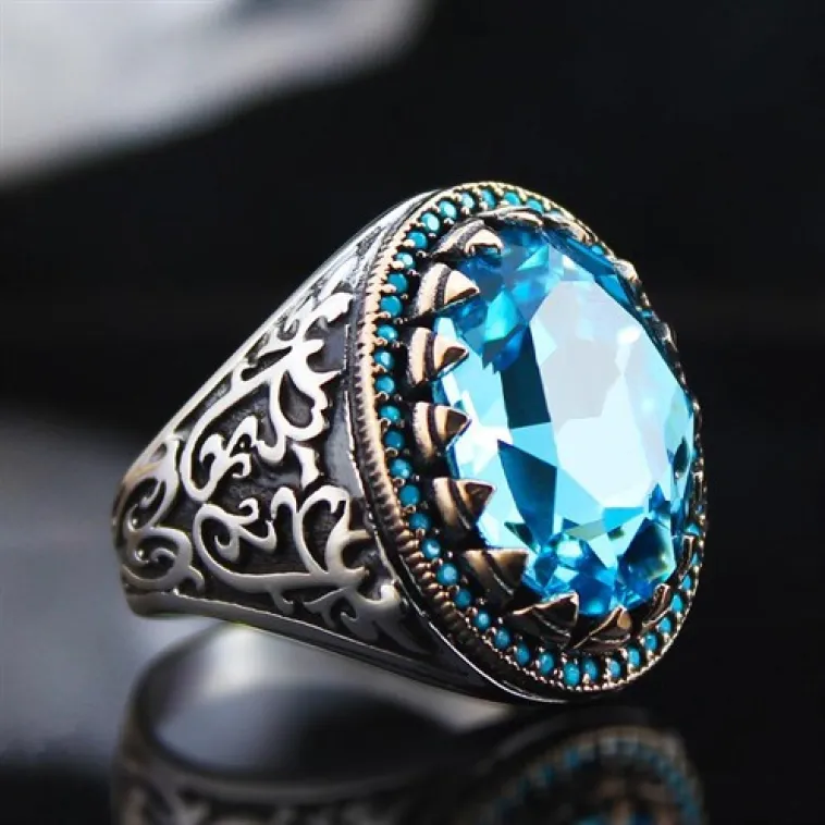 Turkuaz Paraiba Taşlı Yanı İşlemeli Özel Seri Erkek Gümüş Yüzük Turkuaz Paraiba Taşlı Yanı İşlemeli Özel Seri Erkek Gümüş Yüzük