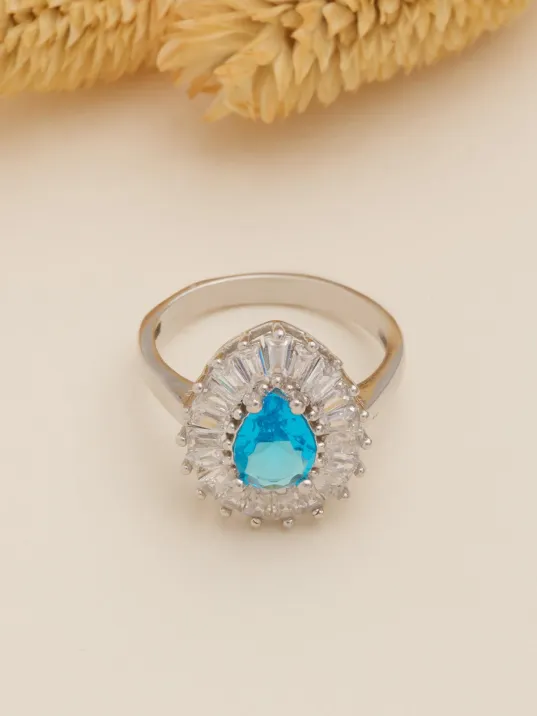 Kadın Gümüş Yüzük - Damla Model Mavi Topaz Taşlı Baget Süslemeli Rodyumlu Kadın Yüzük Kadın Gümüş Yüzük - Damla Model Mavi Topaz Taşlı Baget Süslemeli Rodyumlu Kadın Yüzük