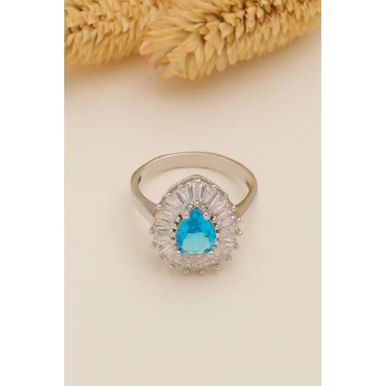Kadın Gümüş Yüzük - Damla Model Mavi Topaz Taşlı Baget Süslemeli Rodyumlu Kadın Yüzük Kadın Gümüş Yüzük - Damla Model Mavi Topaz Taşlı Baget Süslemeli Rodyumlu Kadın Yüzük