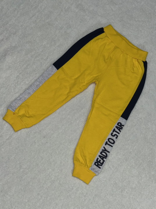 4-6-7 yaş erkek çocuk eşofman diz altı detaylı ek parça sarı 4-6-7 yaş erkek çocuk eşofman diz altı detaylı ek parça sarı