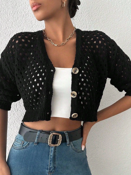 Büyük düğmeli delikli hırka siyah Büyük düğmeli delikli hırka siyah