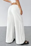 Kadın Beyaz Bol Kesim Cepli Geniş Paça Dökümlü Pantolon – Modern Ve Şık Tasarım Kadın Beyaz Bol Kesim Cepli Geniş Paça Dökümlü Pantolon – Modern Ve Şık Tasarım