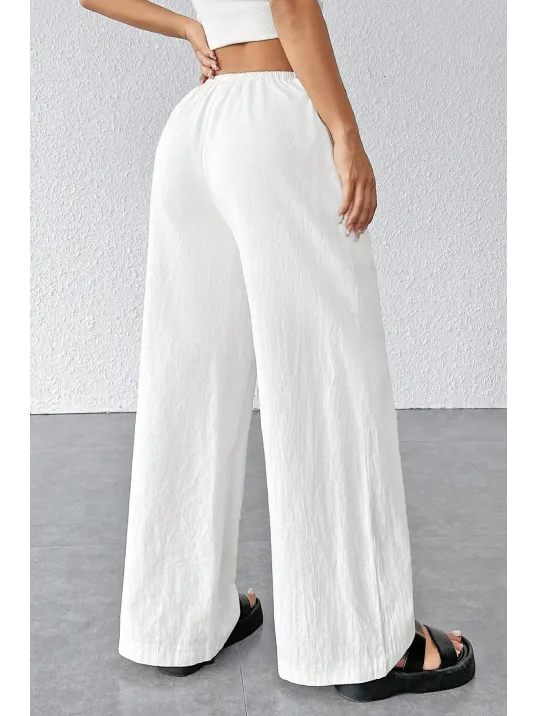 Kadın Beyaz Bol Kesim Cepli Geniş Paça Dökümlü Pantolon – Modern Ve Şık Tasarım Kadın Beyaz Bol Kesim Cepli Geniş Paça Dökümlü Pantolon – Modern Ve Şık Tasarım