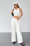 Kadın Beyaz Bol Kesim Cepli Geniş Paça Dökümlü Pantolon – Modern Ve Şık Tasarım
