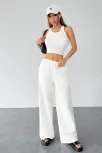 Kadın Beyaz Bol Kesim Cepli Geniş Paça Dökümlü Pantolon – Modern Ve Şık Tasarım Kadın Beyaz Bol Kesim Cepli Geniş Paça Dökümlü Pantolon – Modern Ve Şık Tasarım
