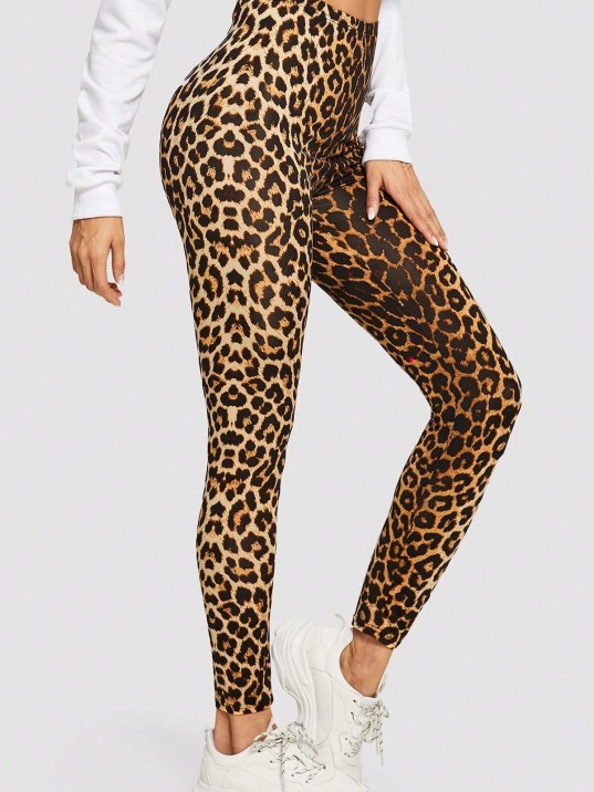 Kadın Leopar Desenli Yüksek Bel Dar Kesim Esnek Tayt – Modern Ve Şık Tasarım Kadın Leopar Desenli Yüksek Bel Dar Kesim Esnek Tayt – Modern Ve Şık Tasarım
