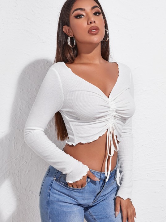 Kadın Beyaz Uzun Kollu Büzdürme Bağcık Detaylı Crop Top Bluz – Şık, Rahat ve Kolay Kombinlenebilir