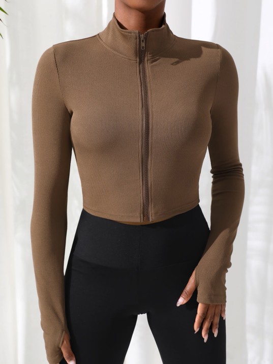 Kadın Kahverengi Uzun Kol Fermuarlı Parmak Geçme Detaylı Dik Yaka Crop Top Bluz – Şık, Rahat ve Kolay Kombinlenebilir
