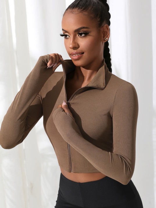 Kadın Kahverengi Uzun Kol Fermuarlı Parmak Geçme Detaylı Dik Yaka Crop Top Bluz – Şık, Rahat ve Kolay Kombinlenebilir