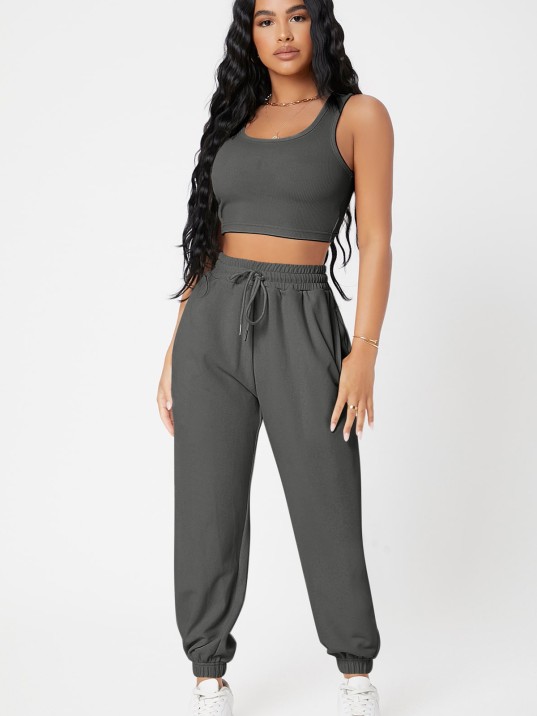 Kadın Antrasit Gri Kaşkorse Cepli Jogger Eşofman Altı ve Crop Top Bluz – Şık, Rahat ve Kolay Kombinlenebilir Kadın Antrasit Gri Kaşkorse Cepli Jogger Eşofman Altı ve Crop Top Bluz – Şık, Rahat ve Kolay Kombinlenebilir