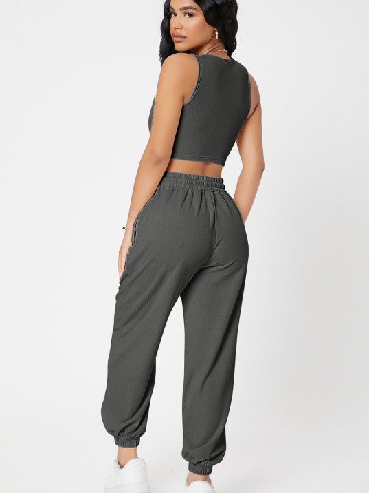 Kadın Antrasit Gri Kaşkorse Cepli Jogger Eşofman Altı ve Crop Top Bluz – Şık, Rahat ve Kolay Kombinlenebilir Kadın Antrasit Gri Kaşkorse Cepli Jogger Eşofman Altı ve Crop Top Bluz – Şık, Rahat ve Kolay Kombinlenebilir