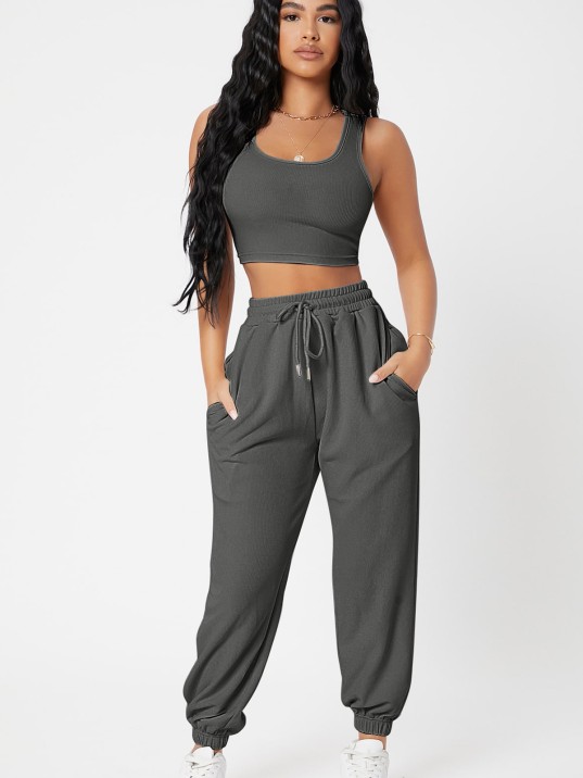 Kadın Antrasit Gri Kaşkorse Cepli Jogger Eşofman Altı ve Crop Top Bluz – Şık, Rahat ve Kolay Kombinlenebilir Kadın Antrasit Gri Kaşkorse Cepli Jogger Eşofman Altı ve Crop Top Bluz – Şık, Rahat ve Kolay Kombinlenebilir