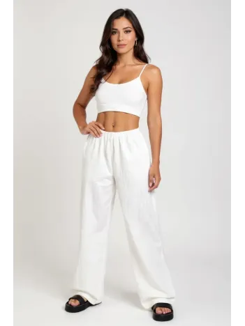 Kadın Beyaz Bol Kesim Cepli Geniş Paça Dökümlü Pantolon – Modern Ve Şık Tasarım