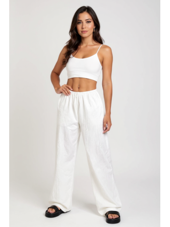 Kadın Beyaz Bol Kesim Cepli Geniş Paça Dökümlü Pantolon – Modern ve Şık Tasarım