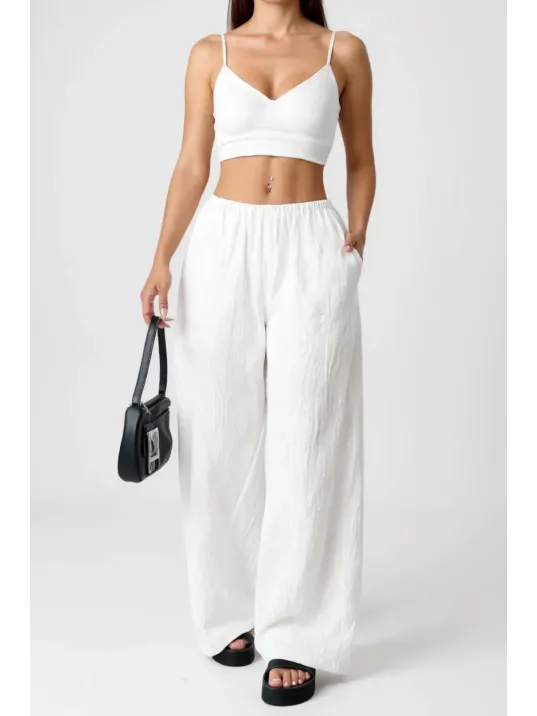Kadın Beyaz Bol Kesim Cepli Geniş Paça Dökümlü Pantolon – Modern Ve Şık Tasarım