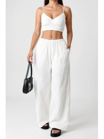 Kadın Beyaz Bol Kesim Cepli Geniş Paça Dökümlü Pantolon – Modern ve Şık Tasarım Kadın Beyaz Bol Kesim Cepli Geniş Paça Dökümlü Pantolon – Modern ve Şık Tasarım
