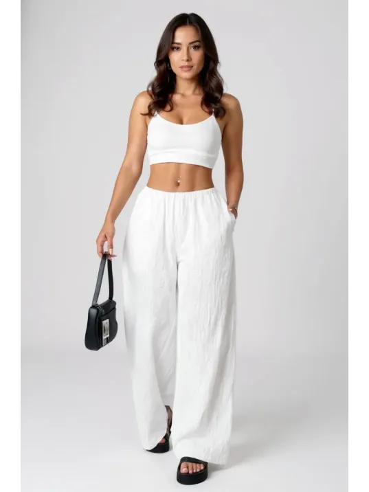 Kadın Beyaz Bol Kesim Cepli Geniş Paça Dökümlü Pantolon – Modern Ve Şık Tasarım
