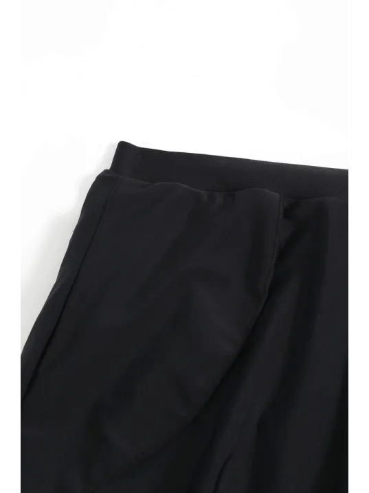 Kadın Siyah Yırtmaçlı Etek Görünümlü Şık Deniz Şortu – Modern Ve Şık Tasarım Kadın Siyah Yırtmaçlı Etek Görünümlü Şık Deniz Şortu – Modern Ve Şık Tasarım