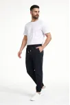 Erkek Jogger Eşofman Altı Rahat Kalıp, Cepli, Lastikli Paça, Günlük Spor Pantolon - Siyah Erkek Jogger Eşofman Altı Rahat Kalıp, Cepli, Lastikli Paça, Günlük Spor Pantolon - Siyah