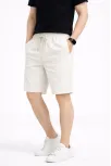Erkek Keten Kumaş Cepli Rahat Kesim Bel Lastikli Şort - Beyaz Erkek Keten Kumaş Cepli Rahat Kesim Bel Lastikli Şort - Beyaz
