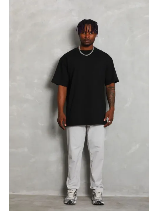 Unisex Oversize Düz Bisiklet Yaka T-Shirt - Siyah Unisex Oversize Düz Bisiklet Yaka T-Shirt - Siyah