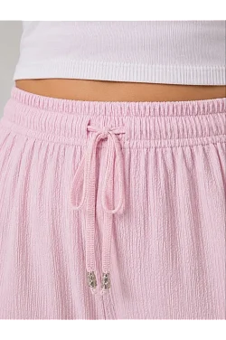 Kadın Battal Beden Bürümcük Kumaş Beli Lastikli Bağcıklı Bol Paça Palazzo Pantolon - Pembe