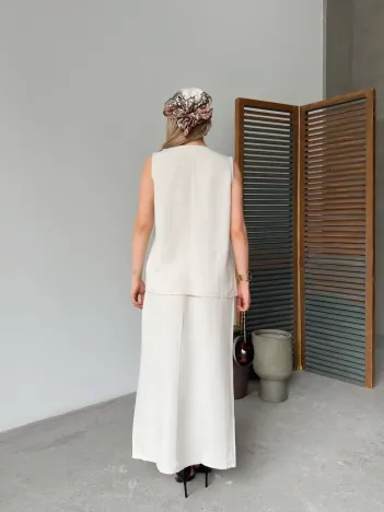 Keten Kolsuz Sıfır Yaka İlik Düğmeli Kolsuz Hırka Etek ikili Takım- Beyaz Keten Kolsuz Sıfır Yaka İlik Düğmeli Kolsuz Hırka Etek ikili Takım- Beyaz