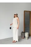 Keten Kolsuz Sıfır Yaka İlik Düğmeli Kolsuz Hırka Etek İkili Takım- Beyaz Keten Kolsuz Sıfır Yaka İlik Düğmeli Kolsuz Hırka Etek İkili Takım- Beyaz